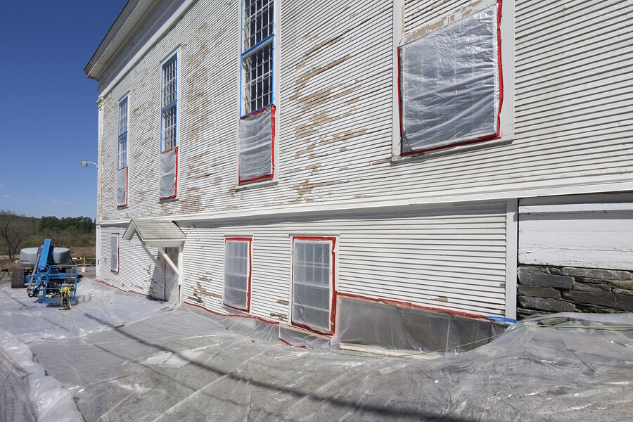 Lead paint removal process on a house.
