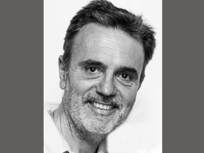 Black and white image of Nicholas Sambanis. 