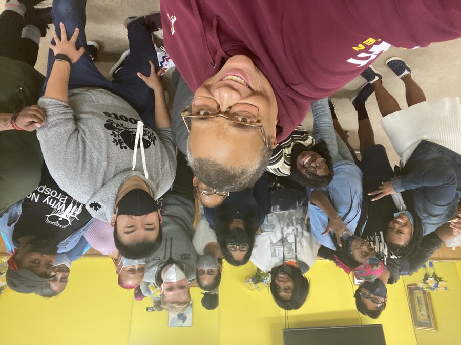 Selfie of Penn Debate Society members and participants in the Why Not Prosper group for formerly incarcerated women