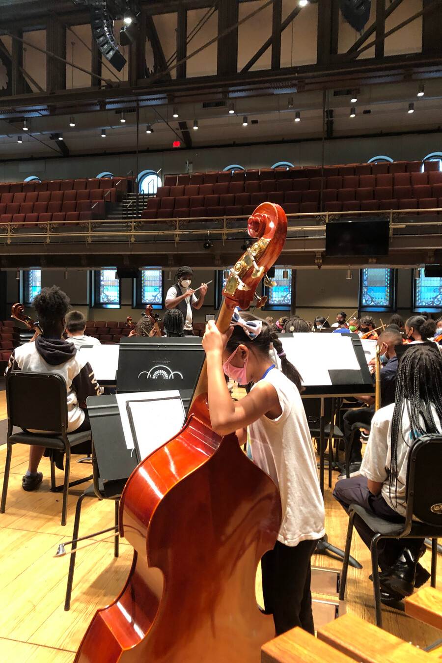 students playing in an orchestra 