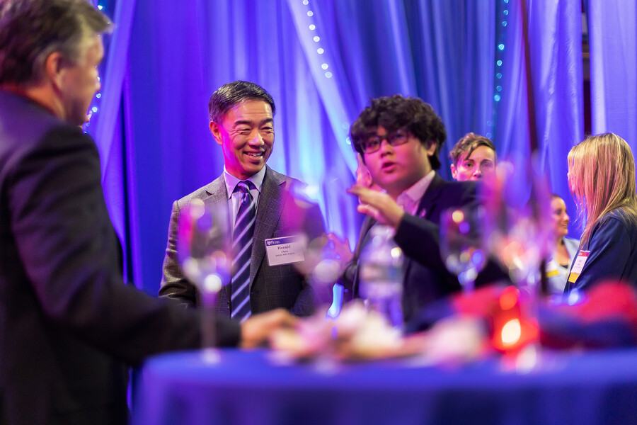 Derek Nhieu and Herald Chen talk at Scholarship Celebration