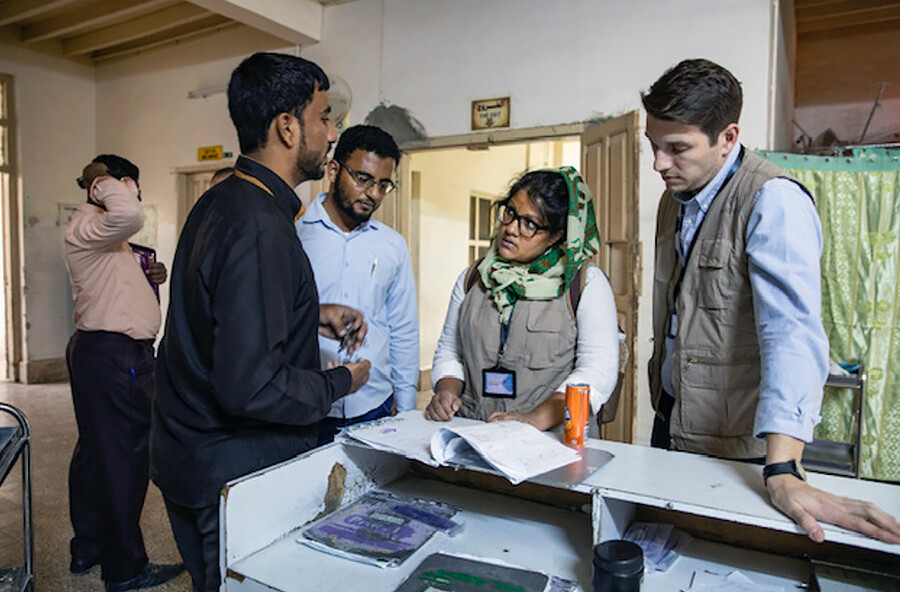 Nahreen Ahmed and medical personnel at a clinic in Yemen.