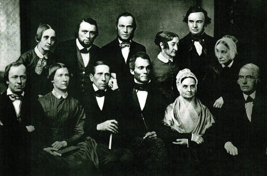 Robert Purvis, center, surrounded by others in a historical photo from 1851.