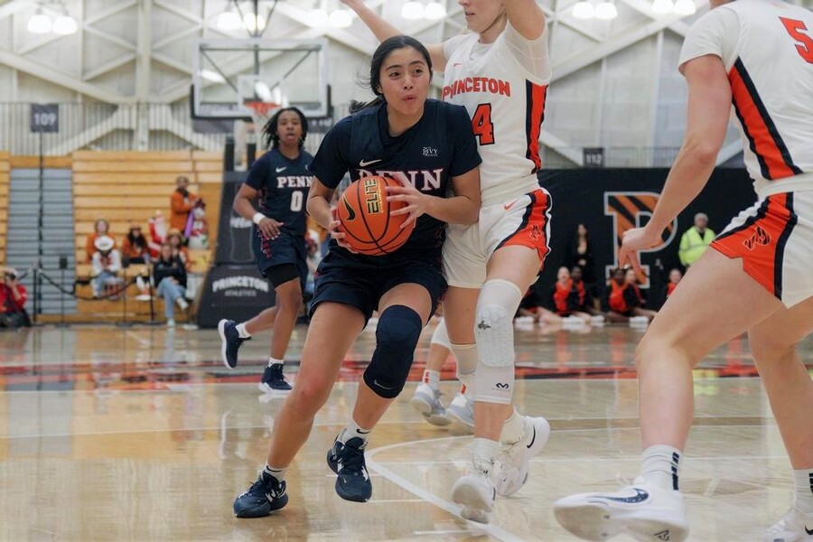 Padilla drives to the basketball against Princeton.