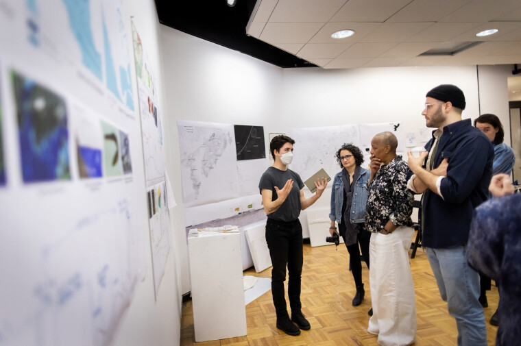 Zoe Kerrich and students in a gallery.
