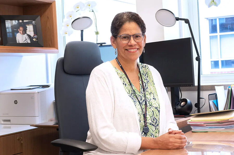 Liz Howell at her desk.
