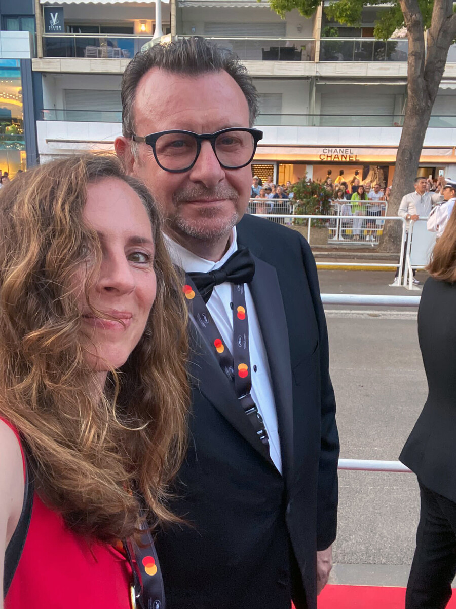 Meta Mazaj and Nicola Gentili dressed in formalwear standing in line