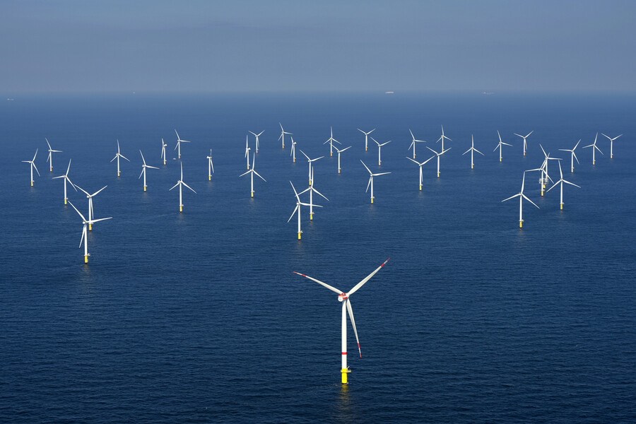 Cluster of windmills in an open sea.