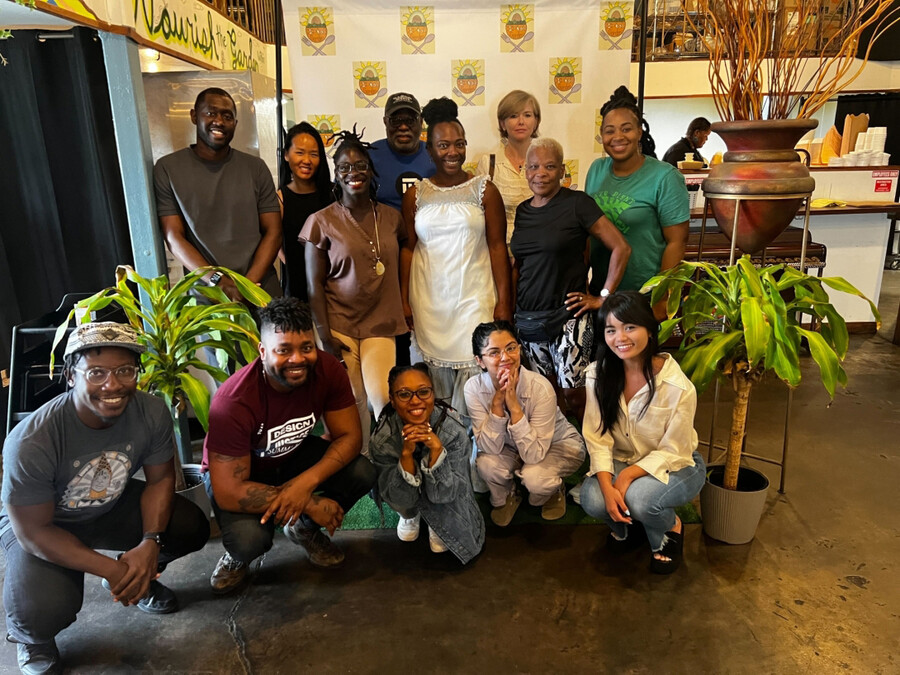 A group of people posing for the cameria in New Orleans.