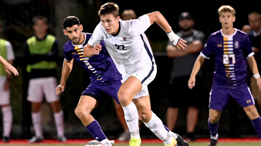 Stas Korzeniowski races toward the ball during a game against Albany.