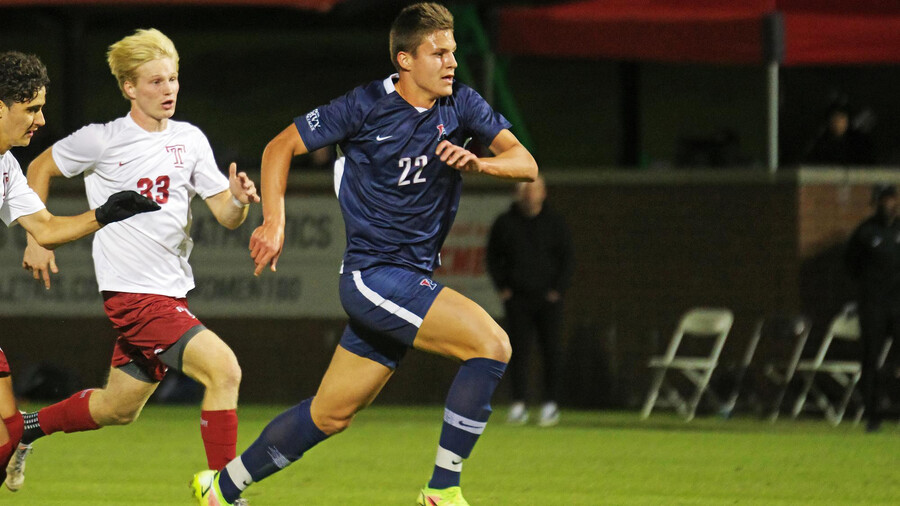 Stas Korzeniowski runs up the field toward the ball during a game against Temple.