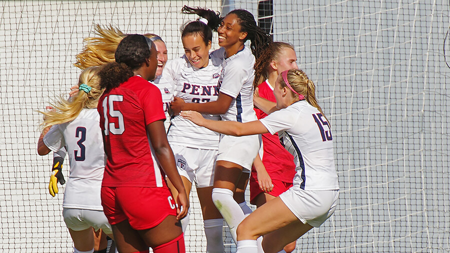 Ginger Fontenot celebrates and hugs her teammates.