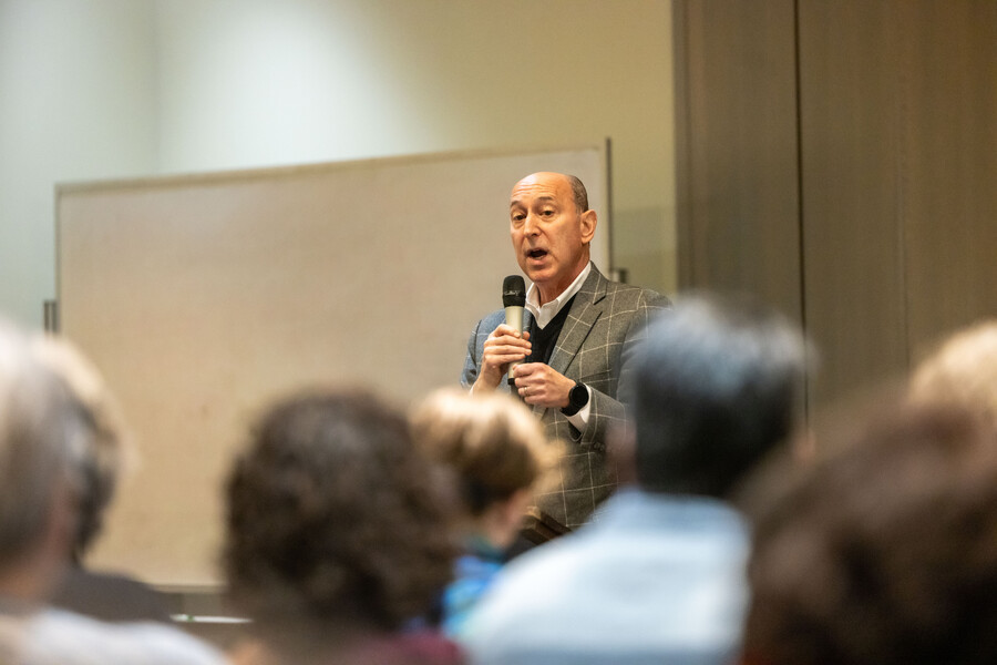 Philip Darivoff speaking at a microphone