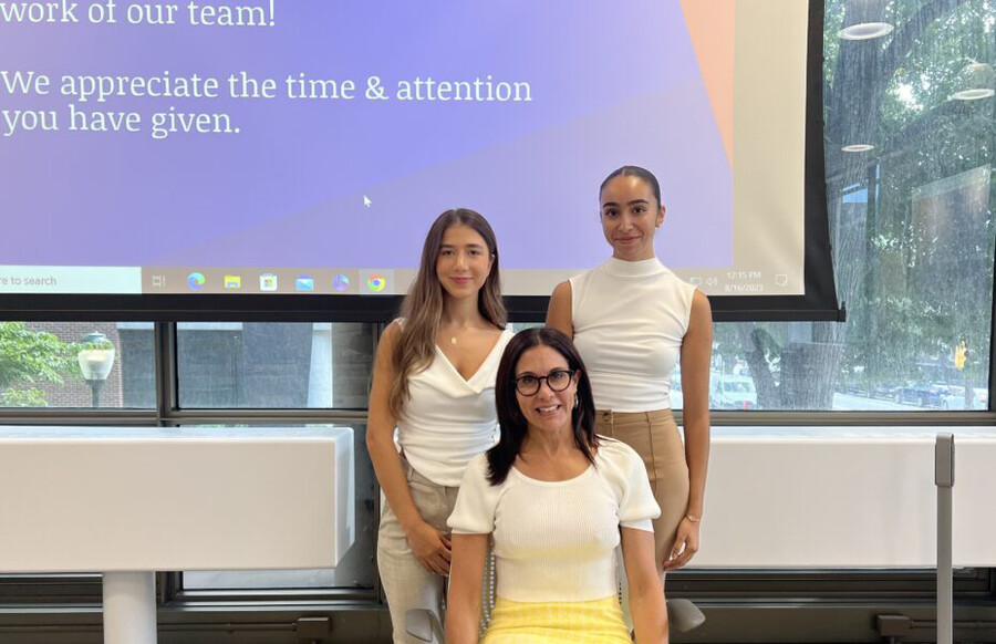 Sindi Banaj (left) and Maryem Bouatlaoui (right) with Gillian Bazelon (seated).