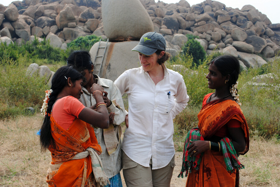 Kathleen Morrison and three people in India.