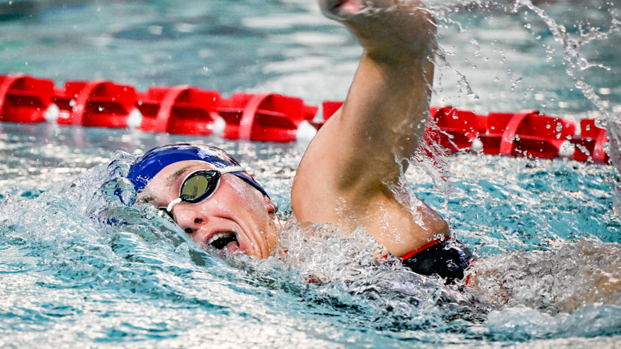 Anna Kalandadze takes a breath while swimming during a race.