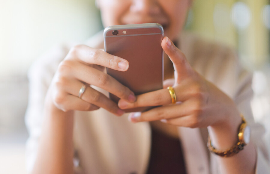 Person looking at a smartphone.