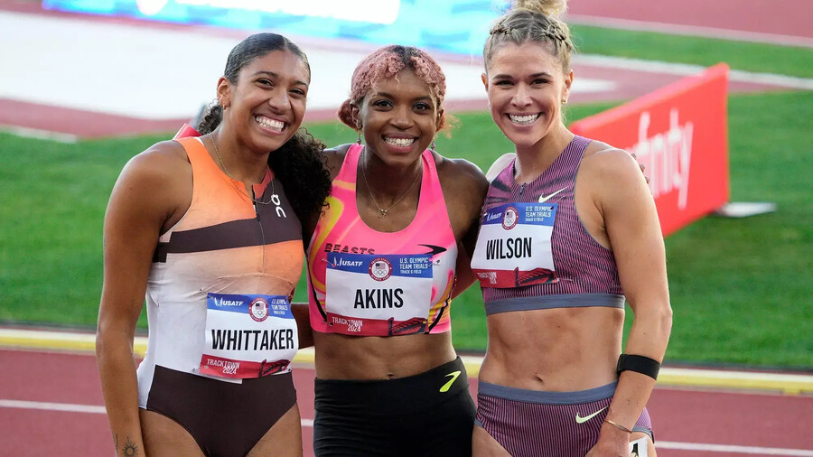 2020 Penn graduate Nia Atkins, center, won the 800 meter finals at the 2024 Olympic trials.