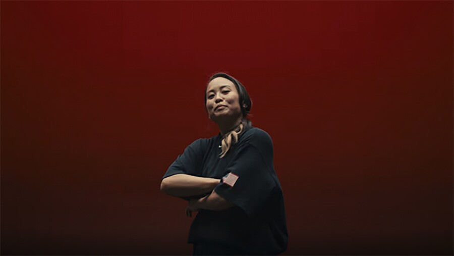 Grace "Sunny" Choi poses with her arms folded