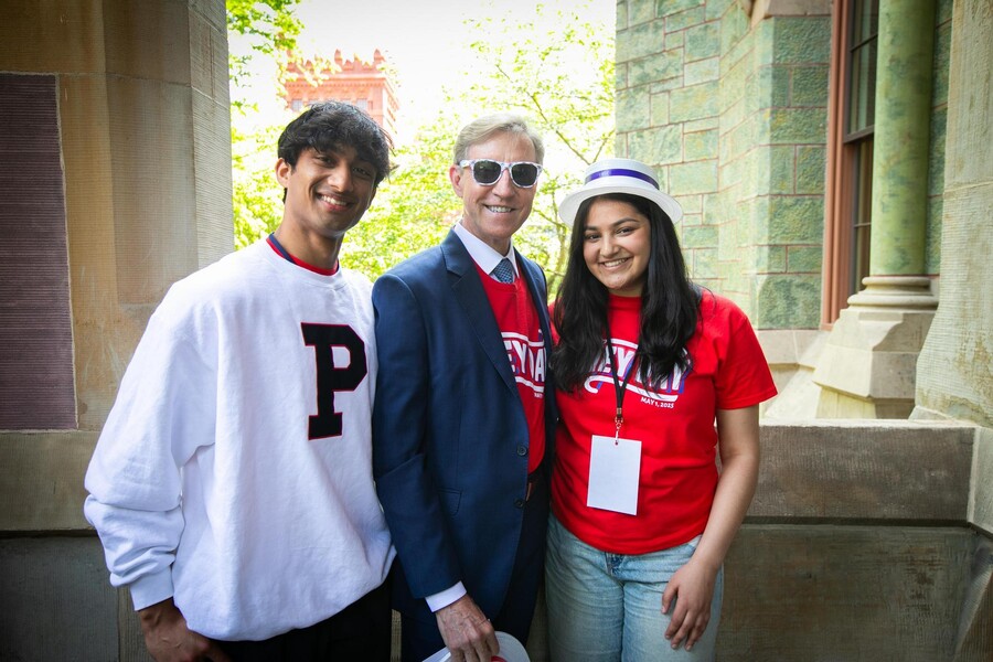 Penn’s outgoing Class President and upcoming class president with Penn President J. Larry Jameson on the steps of College Hall.