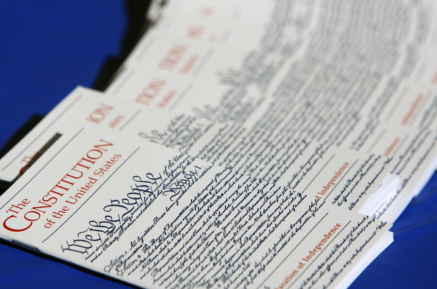 A stack of pocket constitutions.