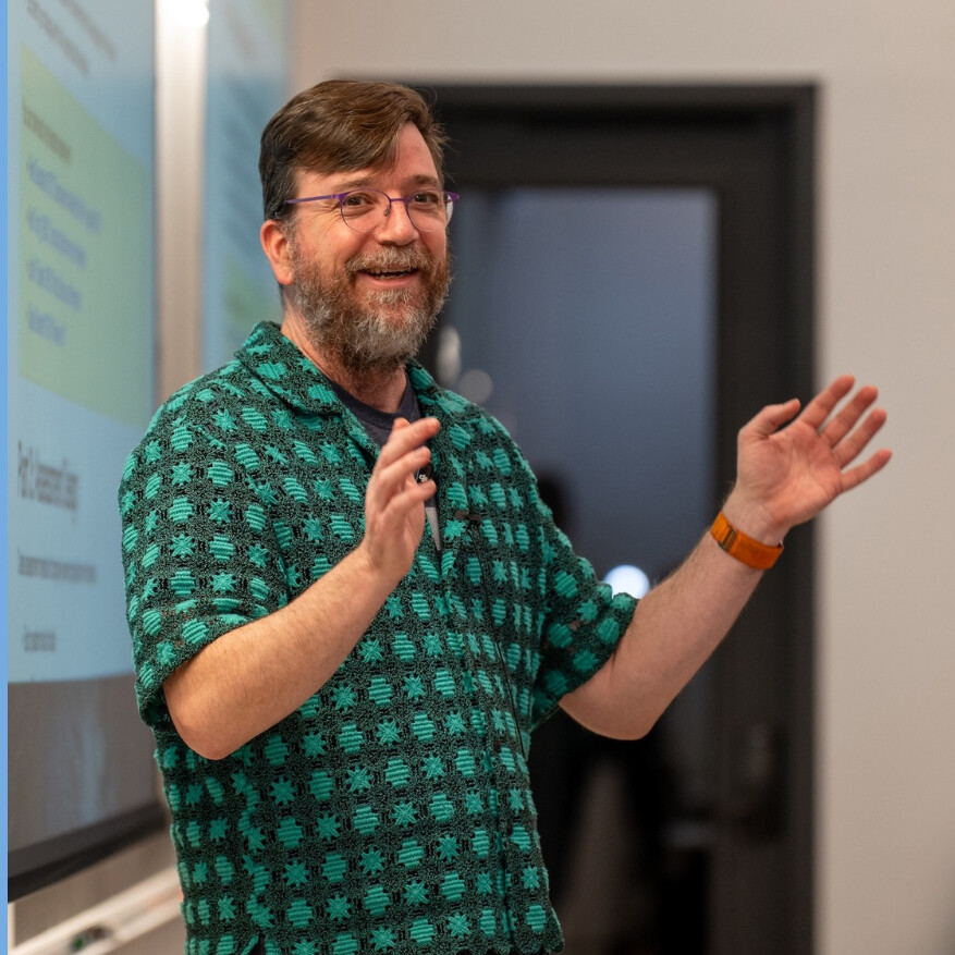Chris Callison-Burch teaching in a classroom.