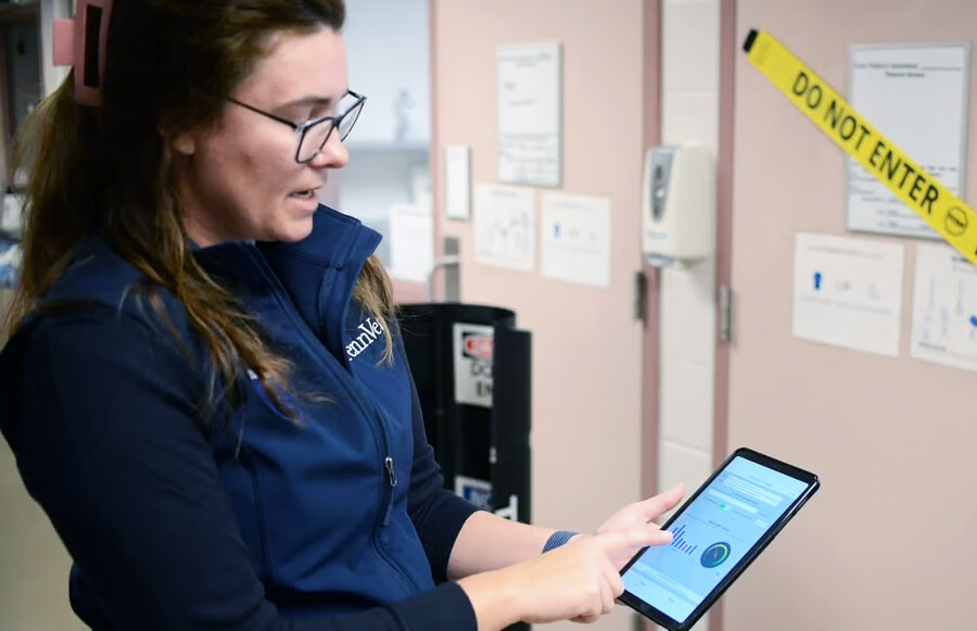 Felicia Divito with an iPad at New Bolton Center.