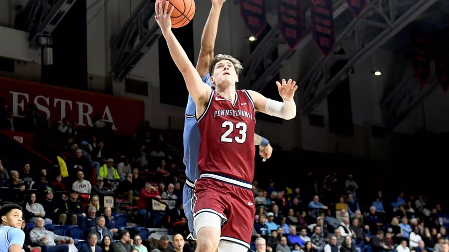 Ethan Roberts shooting a basket.