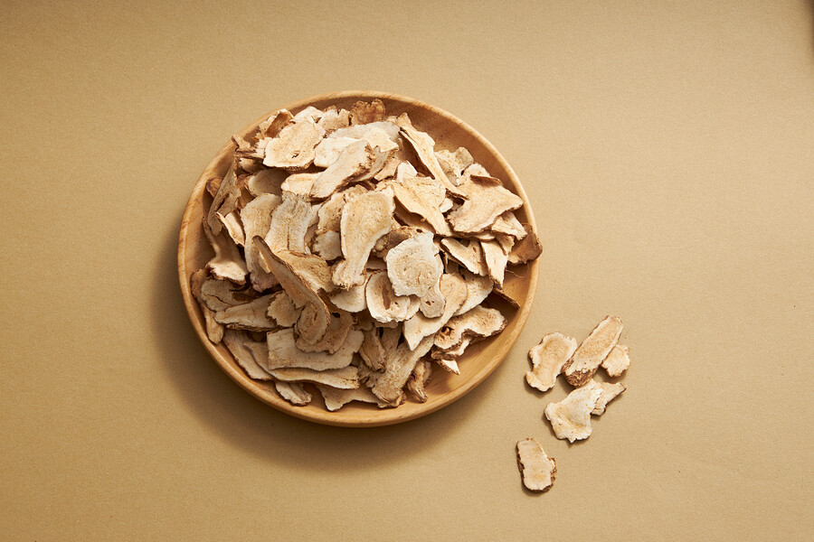 A bowl of dried ginger root for traditional Chinese medicine.