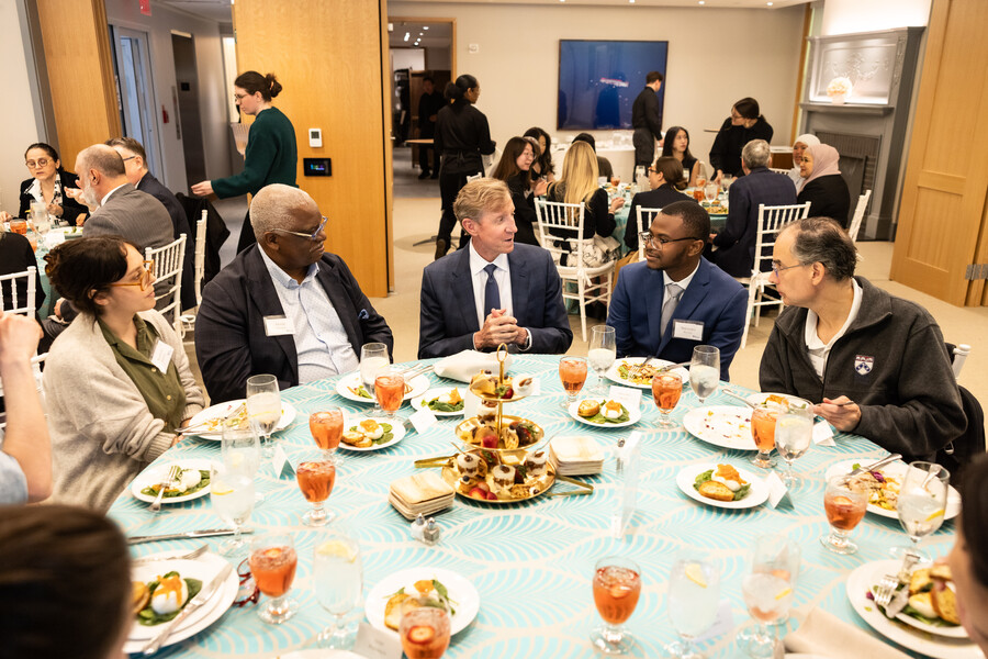 Penn President J. Larry Jameson seated next to Nhlanhla Mavuso and others at the PIP PEP luncheon.