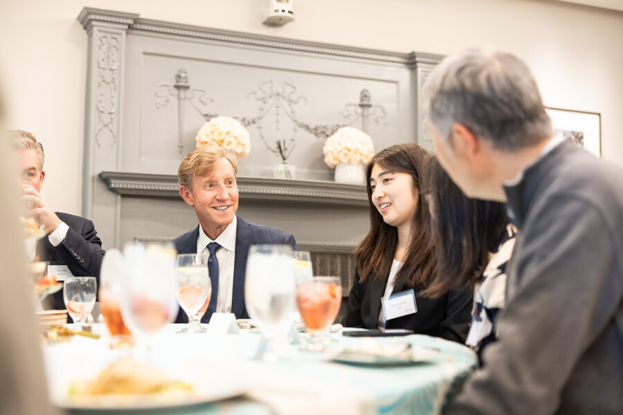 Penn President J. Larry Jameson seated next to Margaret Zhu at the PIP/PEP luncheon.