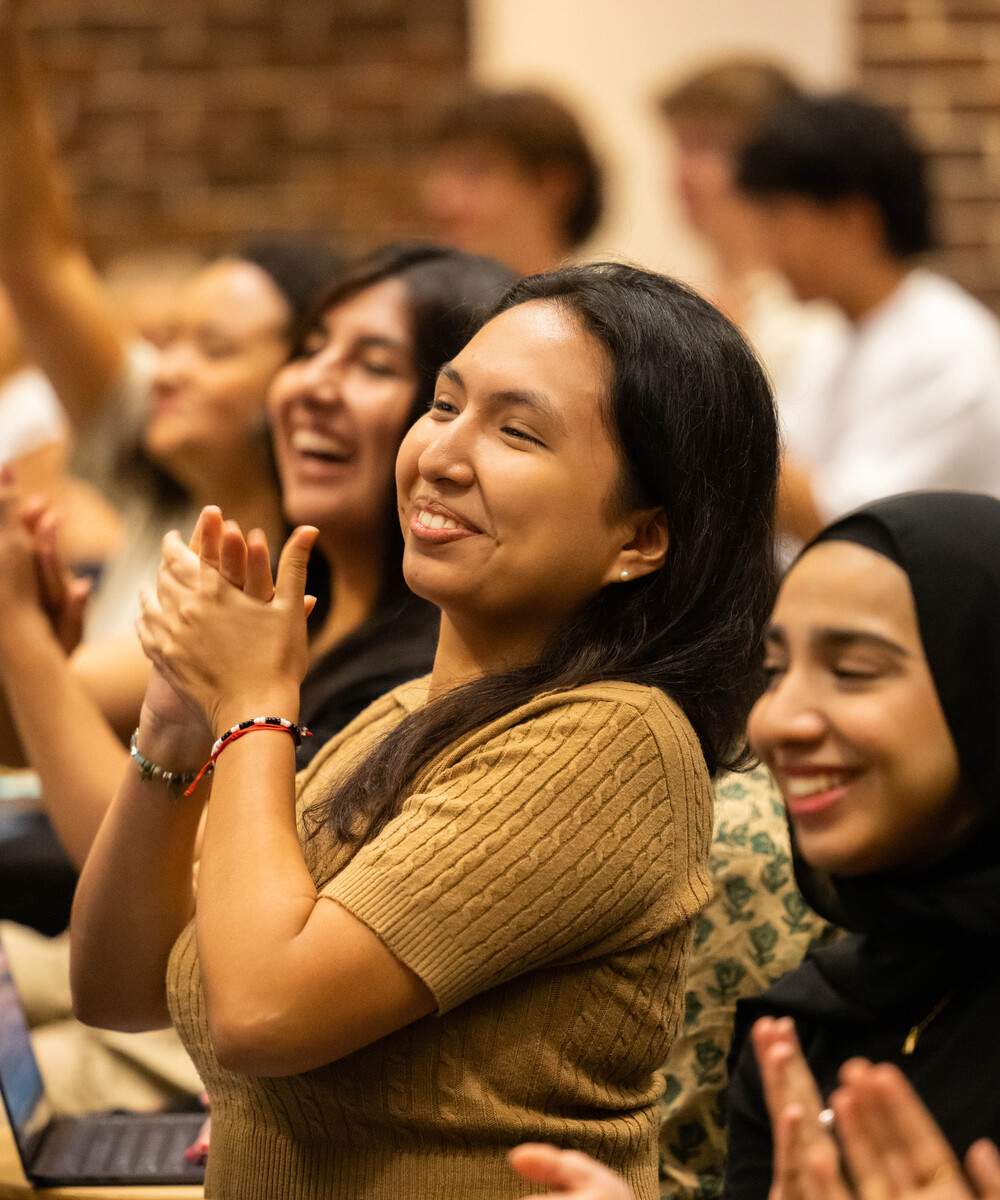 Students in an auditorium at the NSO international students reception.
