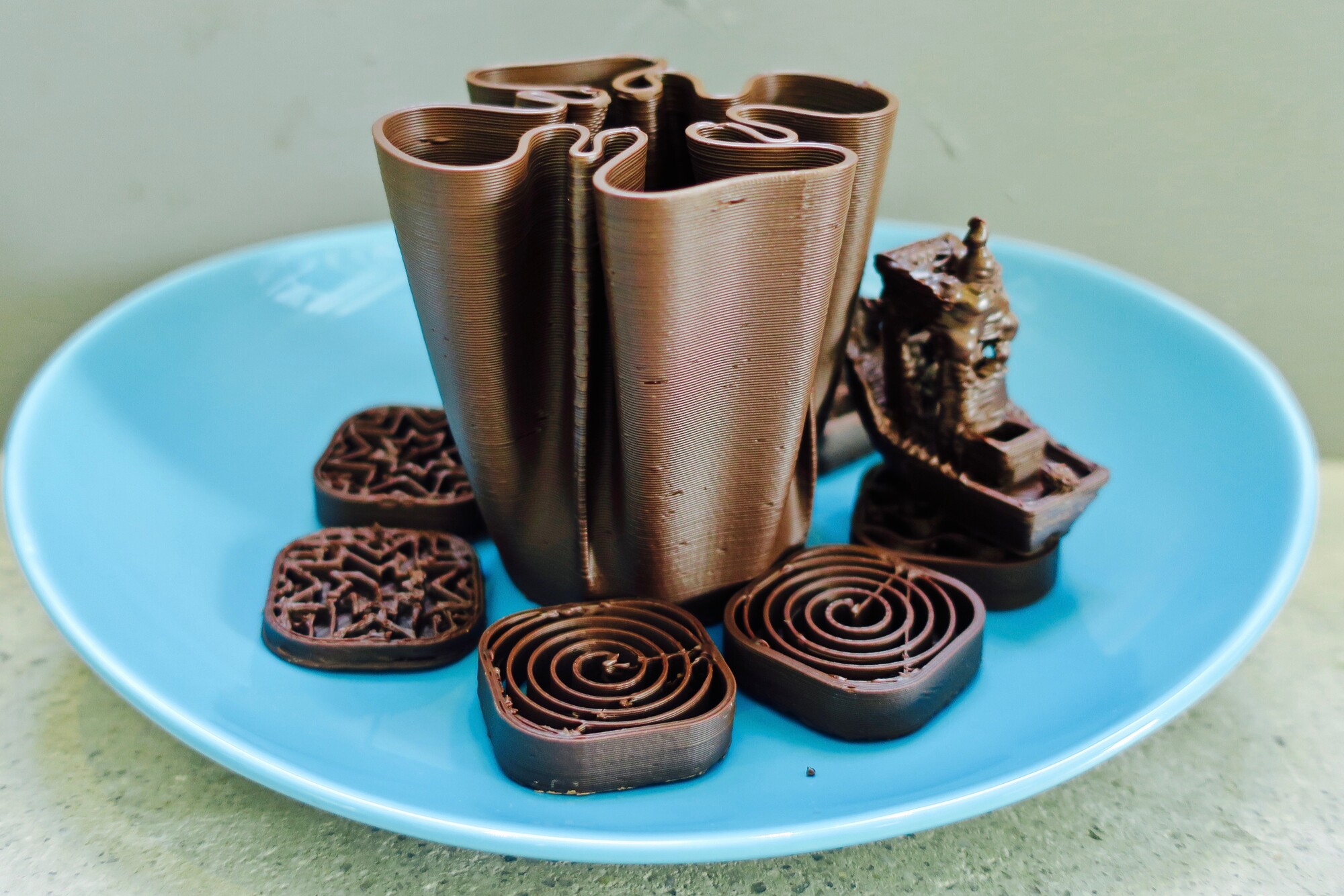 A dish of bespoke 3D printed chocolates