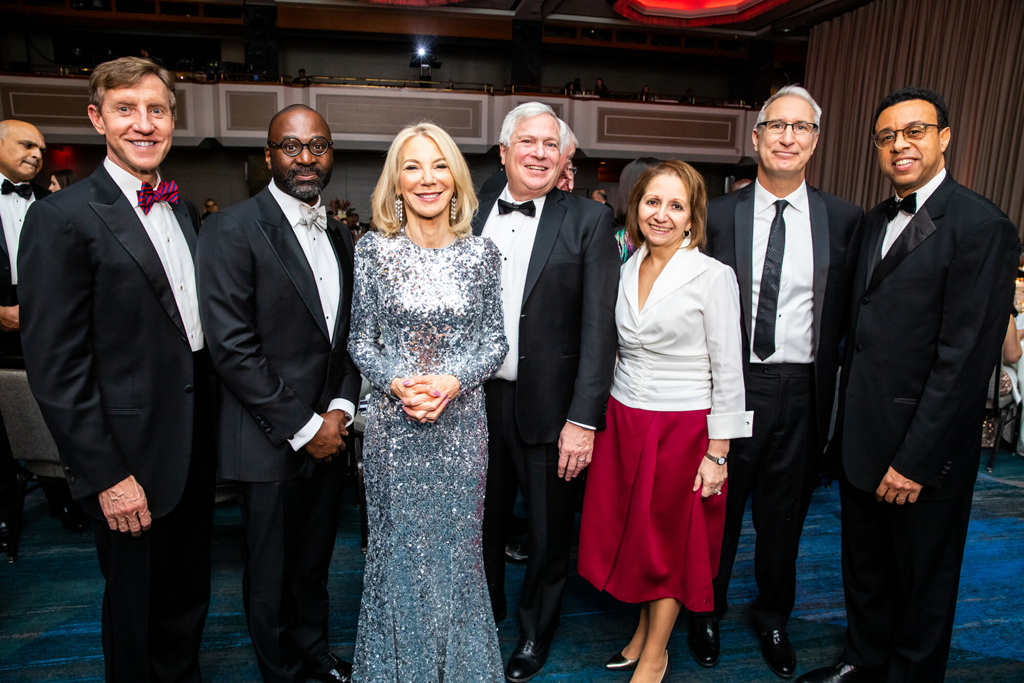 Group photo of Penn President Amy Gutmann and xxxx