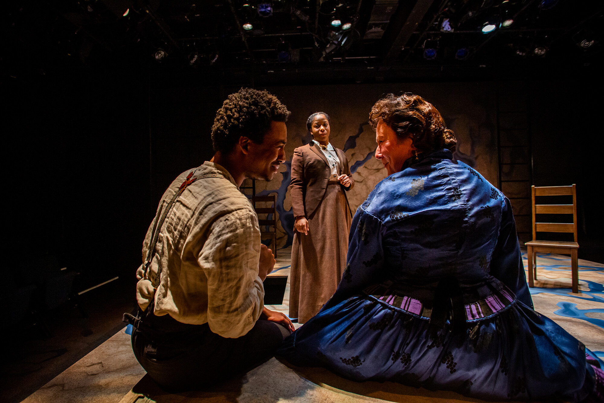 Aaron Bell, Danielle Leneé and Cheryl Williams performing on stage