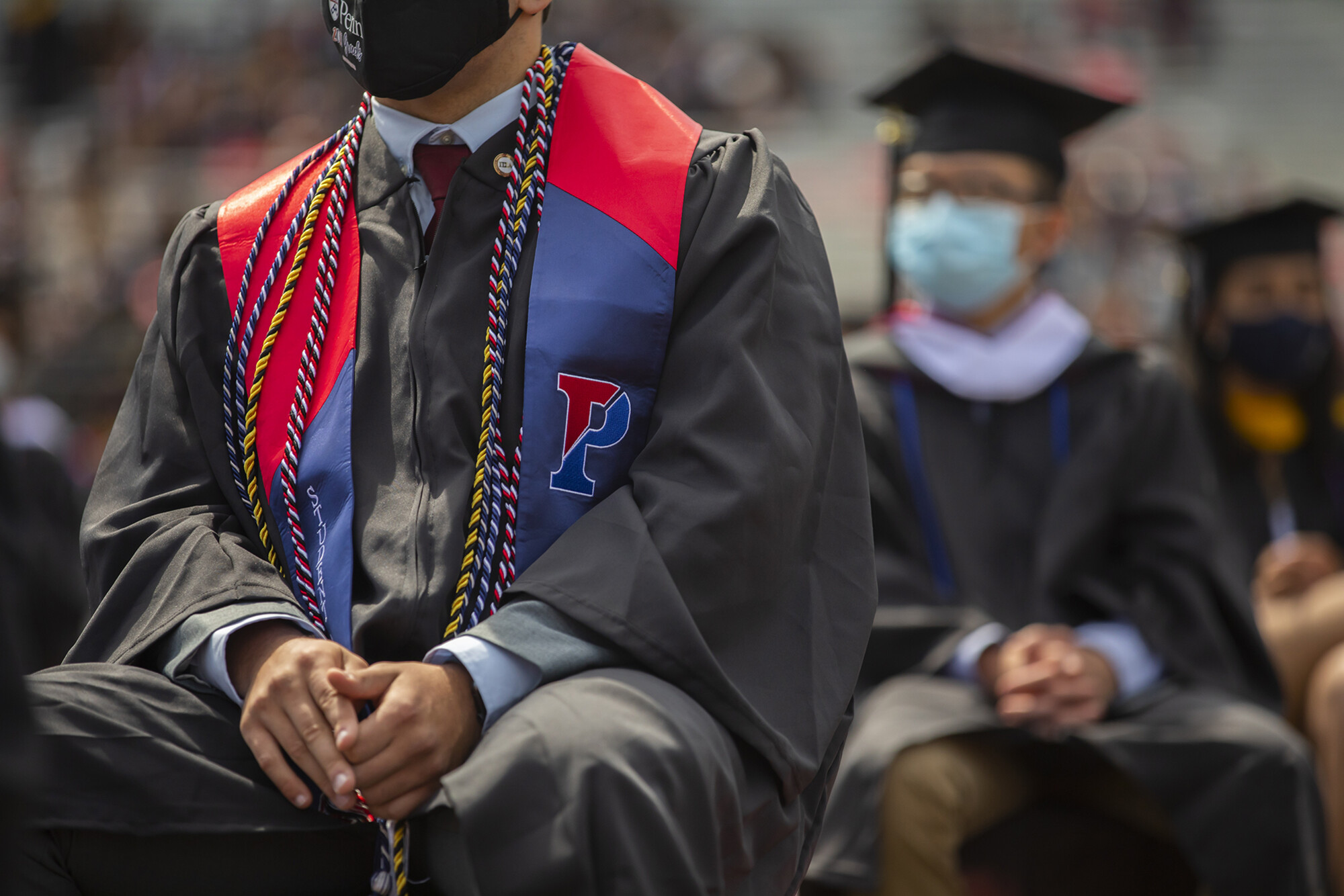 close up of graduates hands