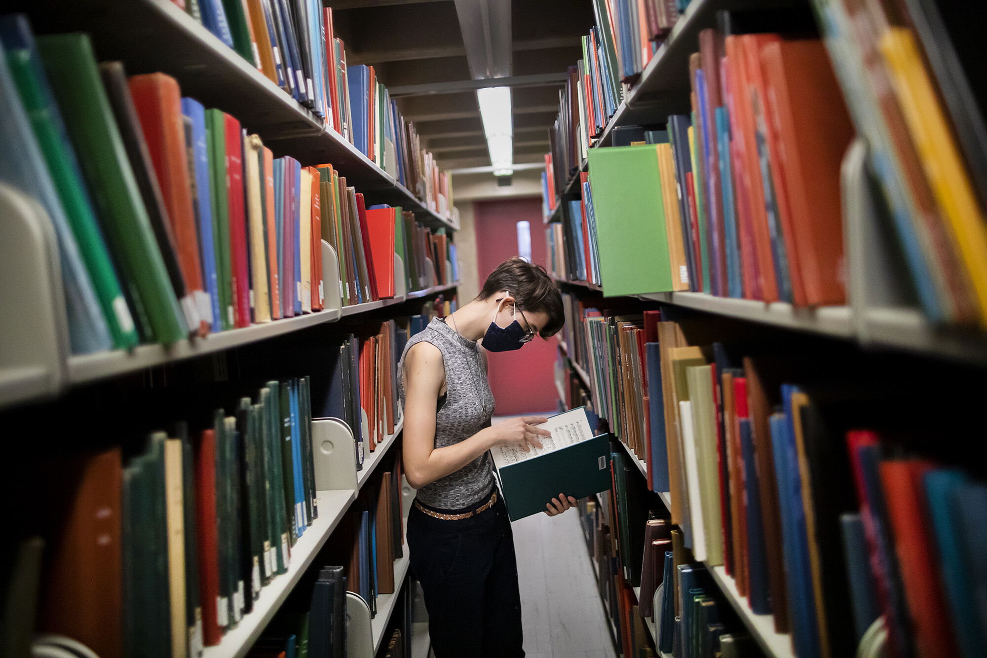 quinn gruber in the library stacks