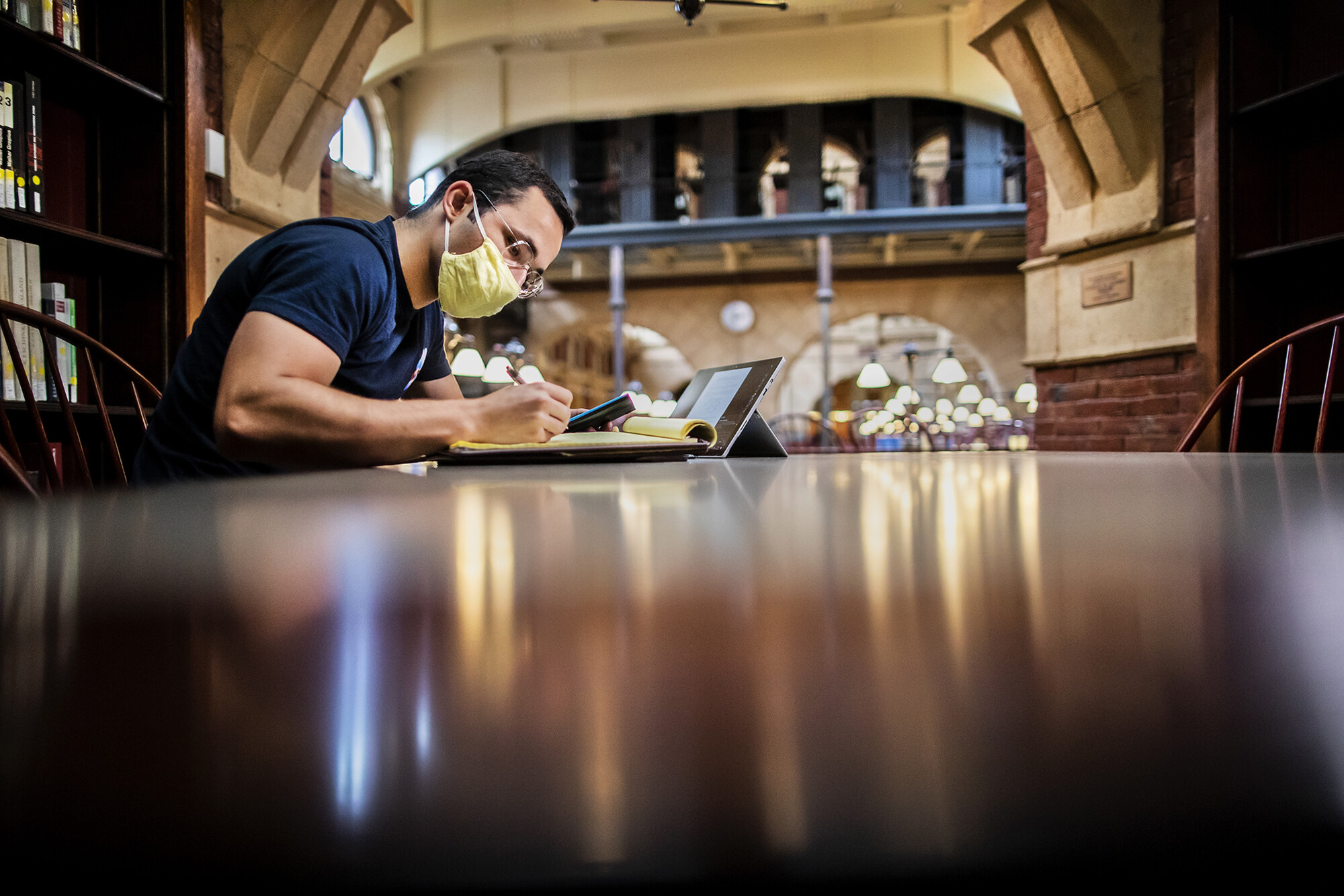 francisco barrera at a table in fisher fine arts