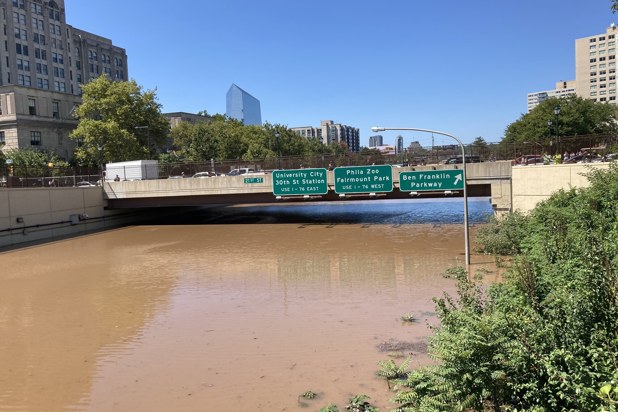 Vine Street underpass flooded with rainwater.