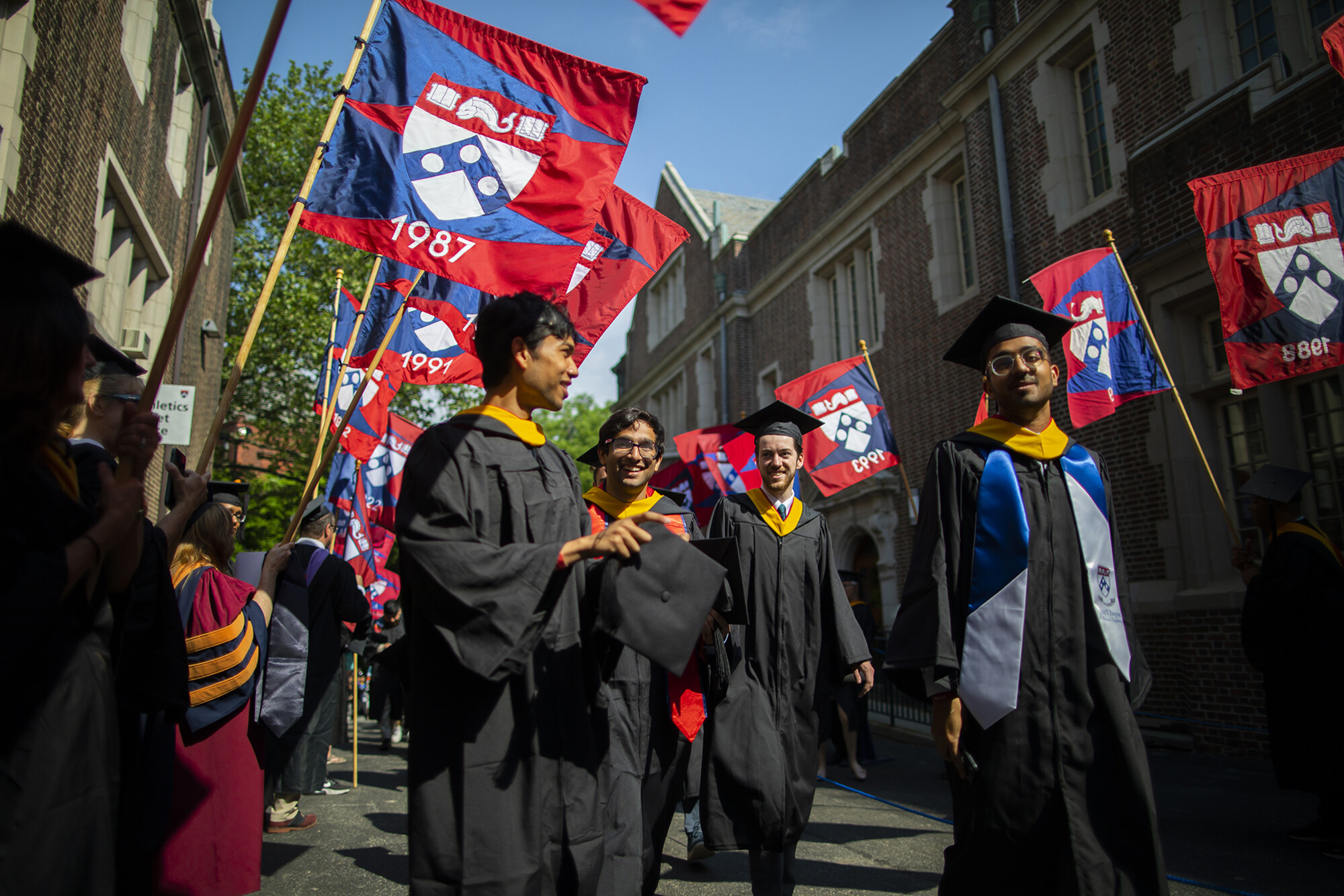 graduates enter franklin field