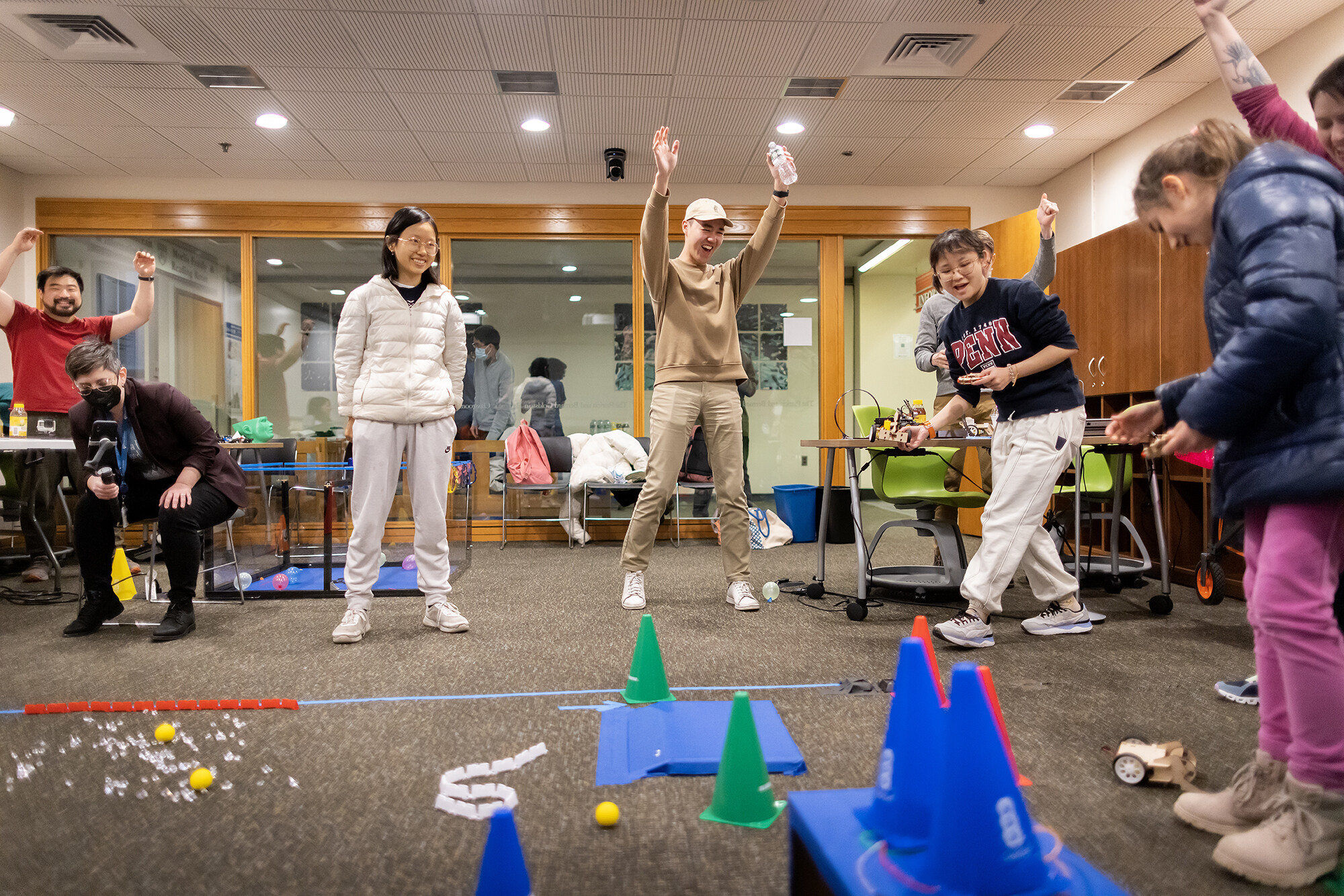 students celebrate a maker space bot win