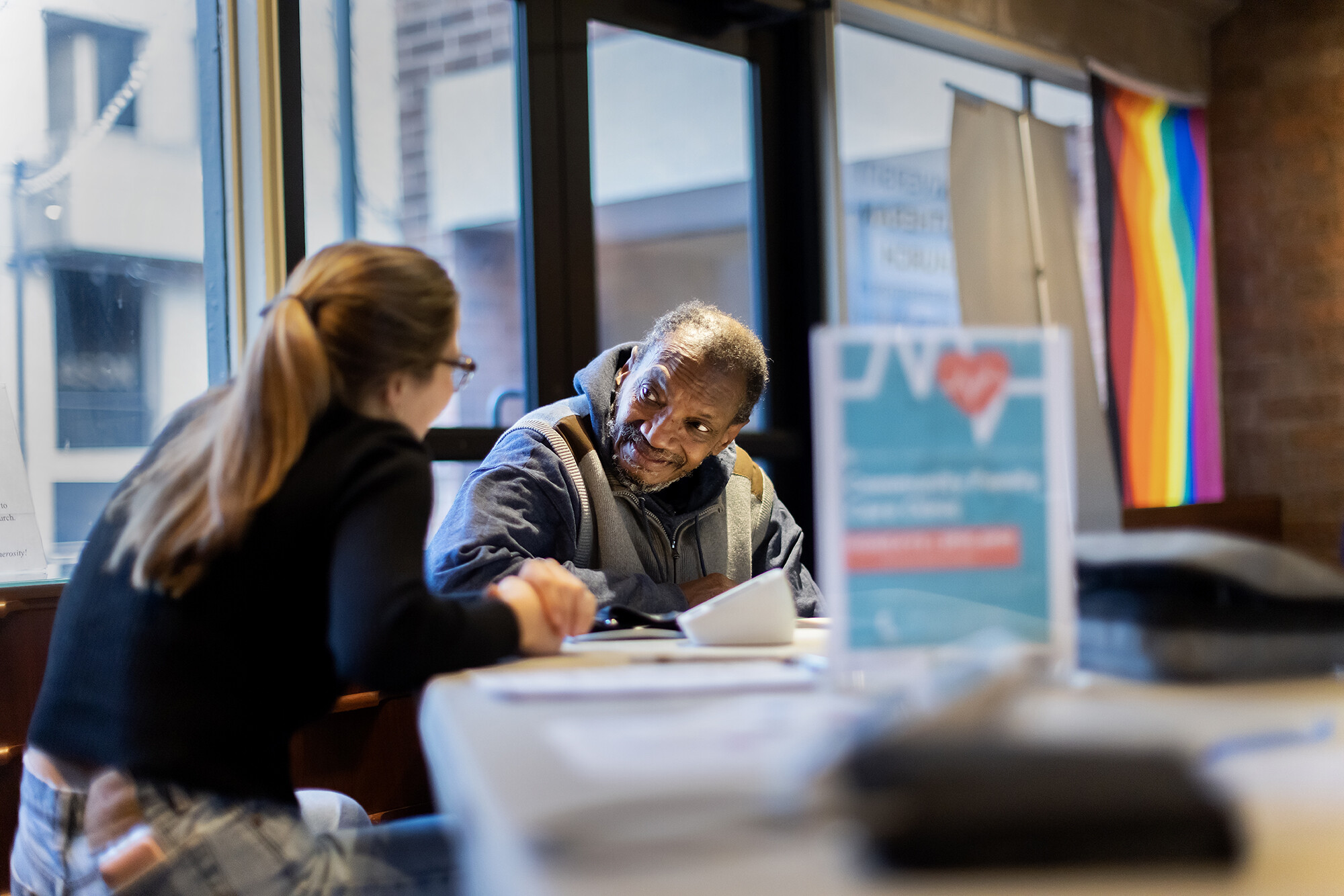 shelter health worker with patient