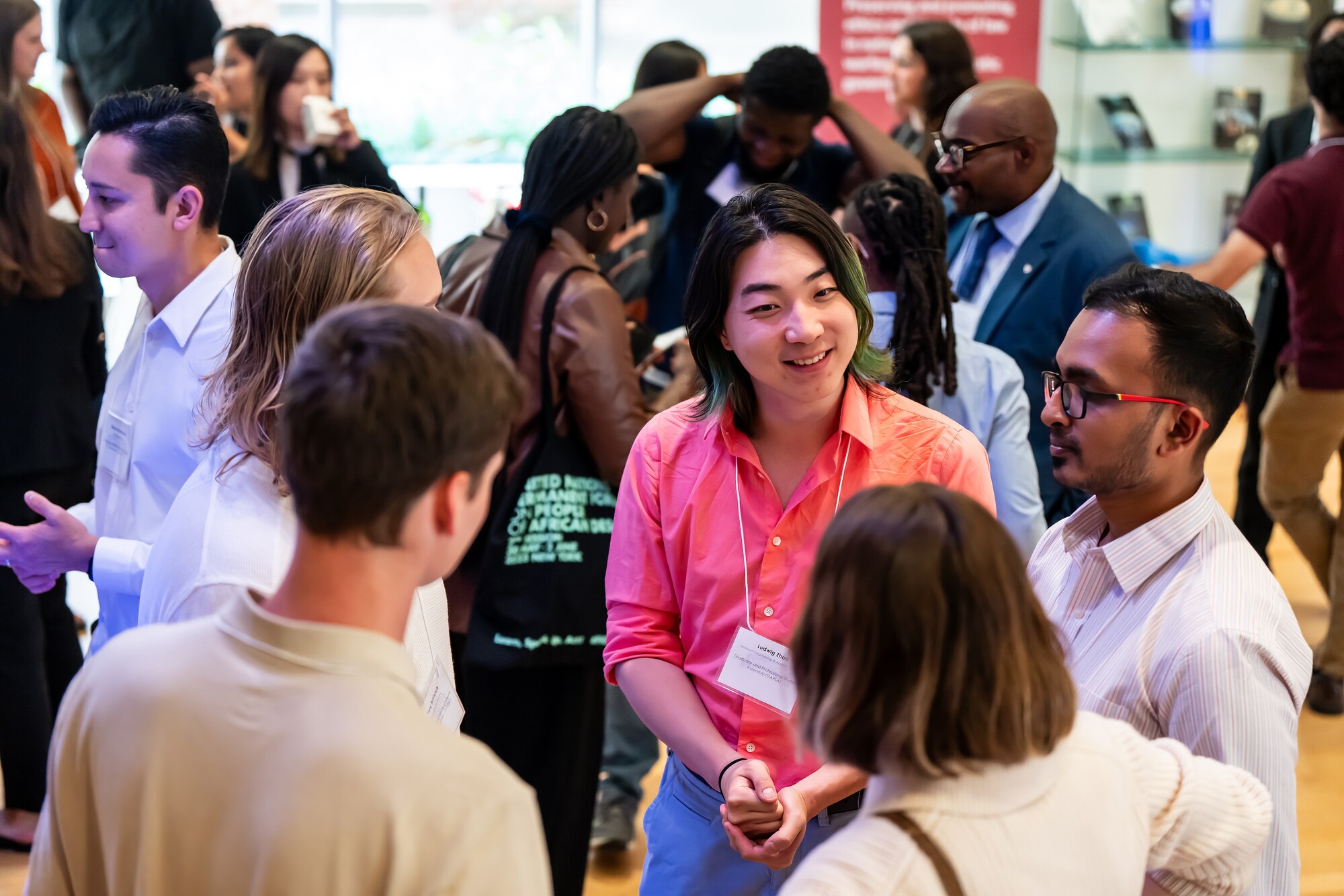 Graduate students mingle at a reception
