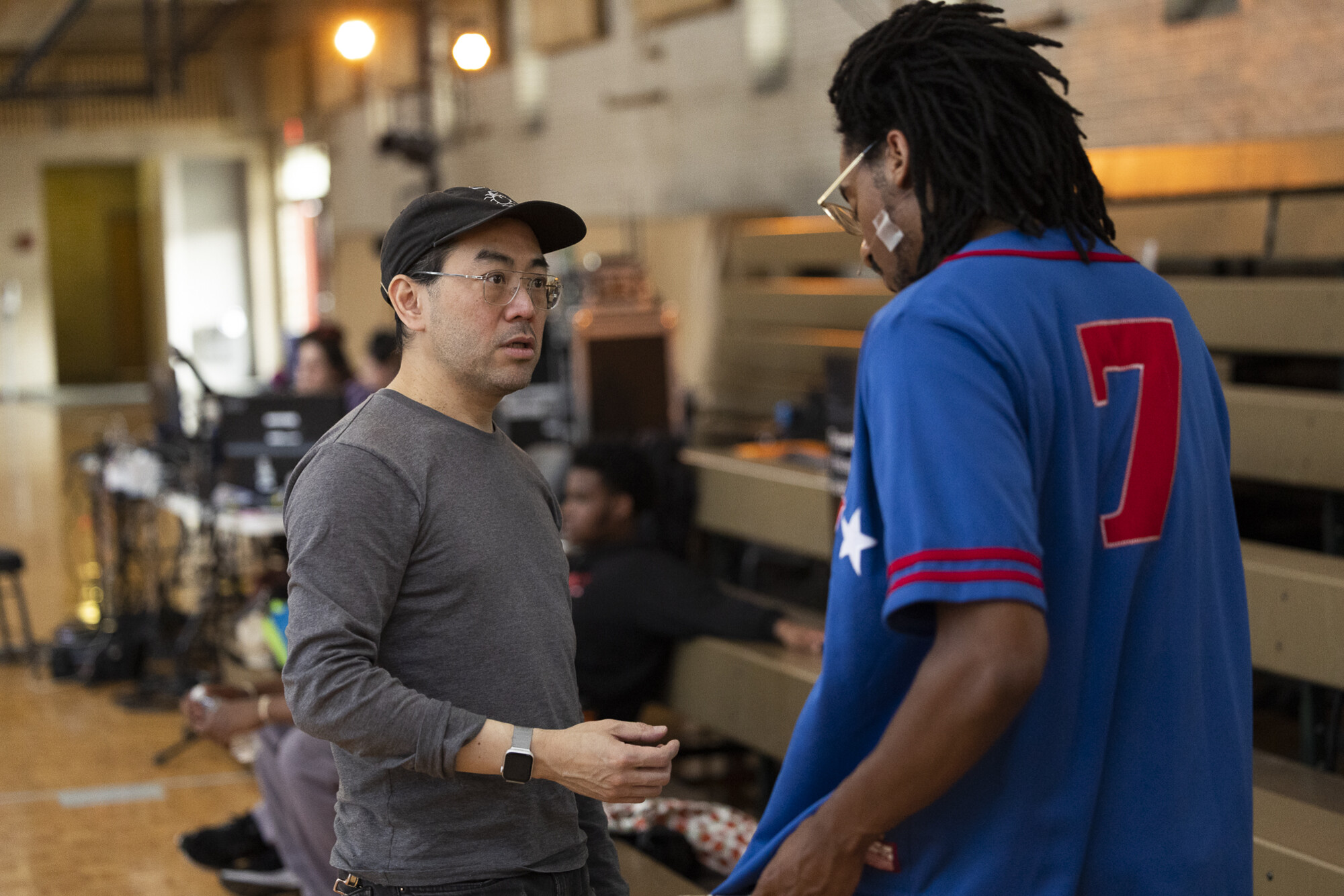 eugene speaking to members during be holding performance
