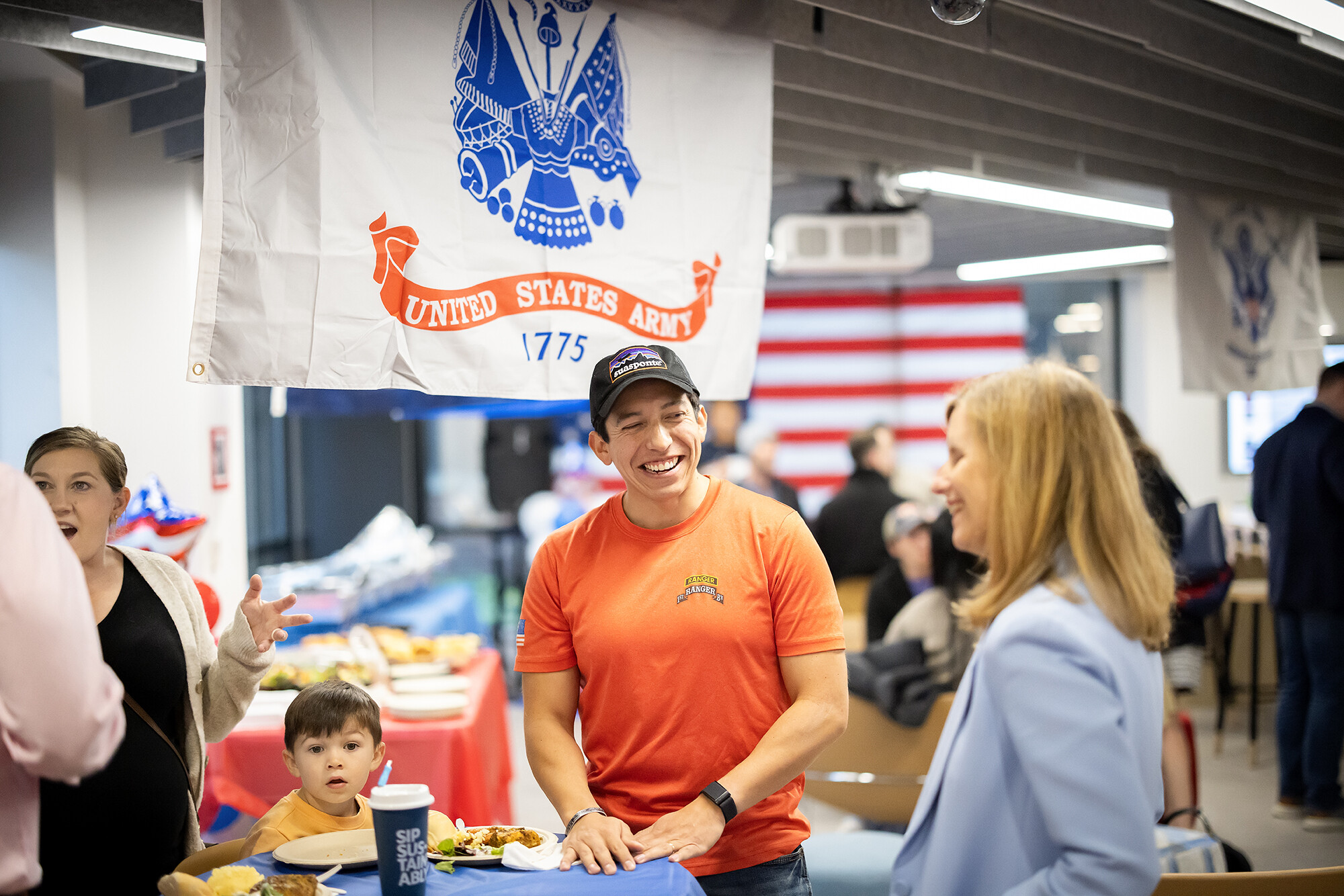 student talk with penn president magill during veterans day lunch