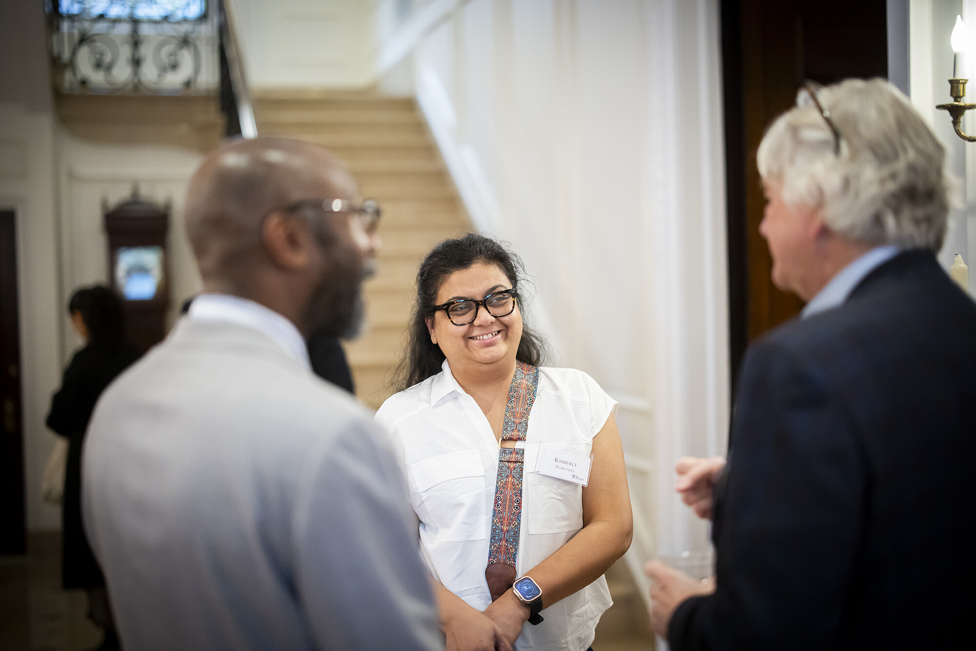 Provost Jackson, Dean Steiner, and Fellow chat at the reception