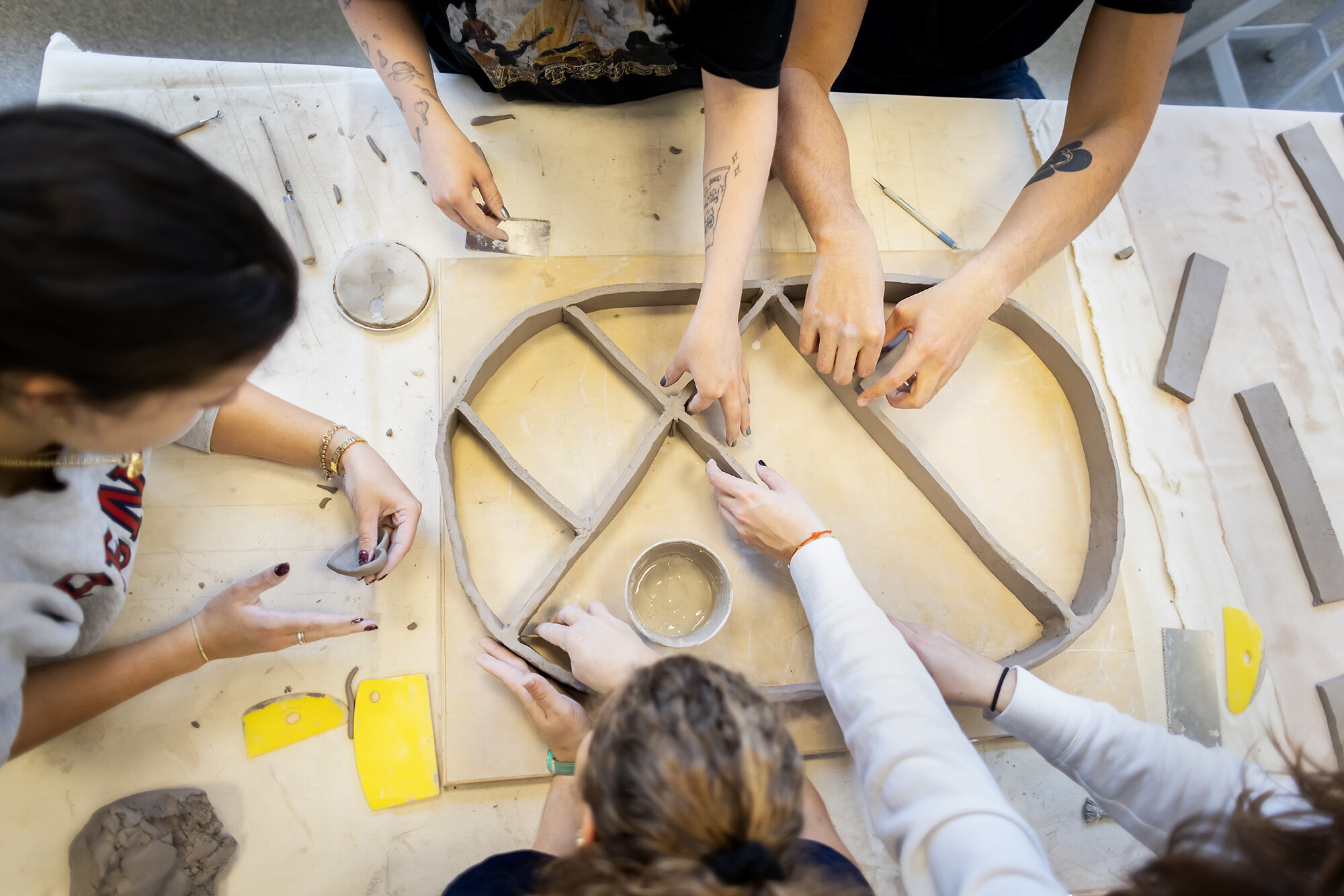 top down view of clay work at a table