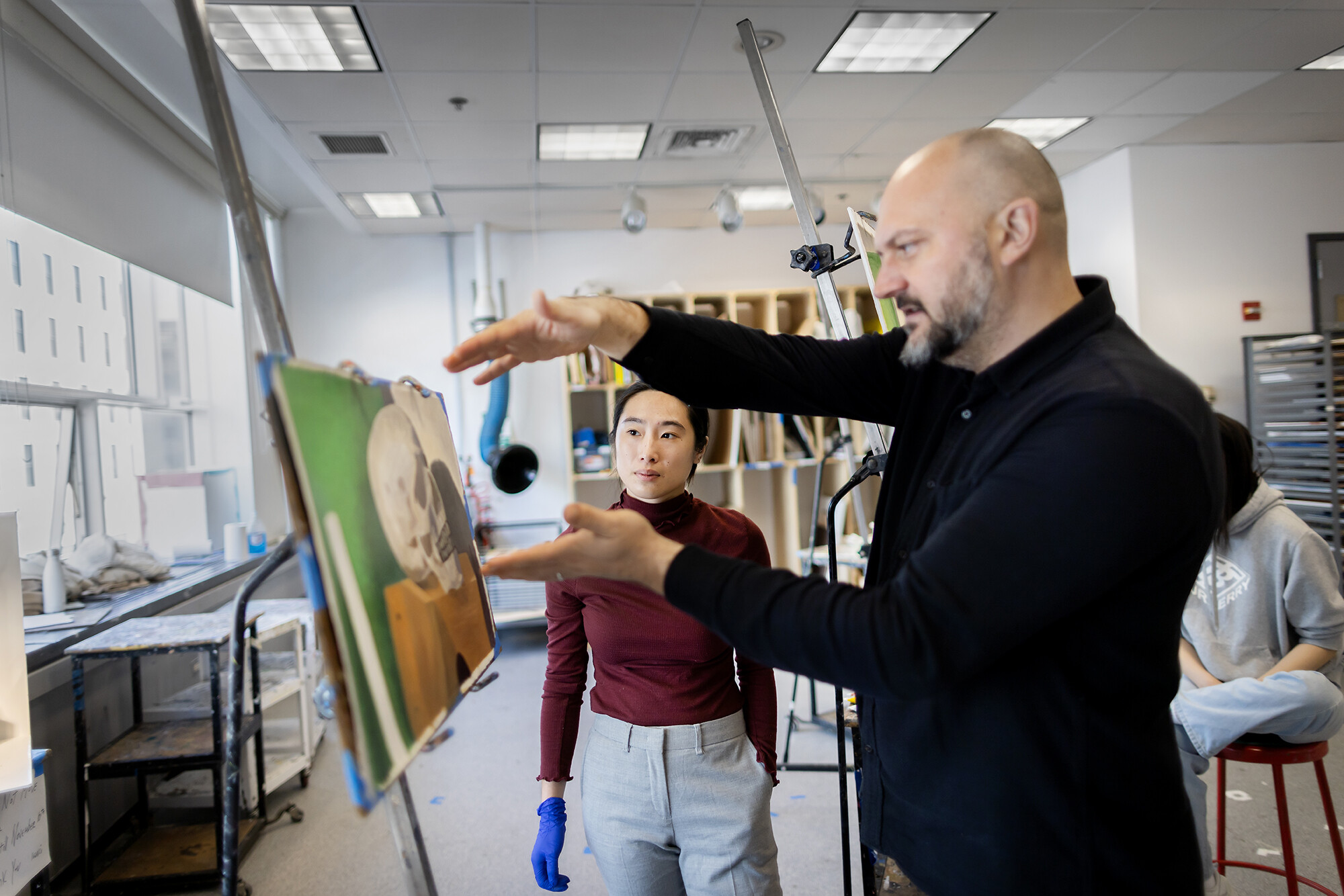 painting faculty advises a student