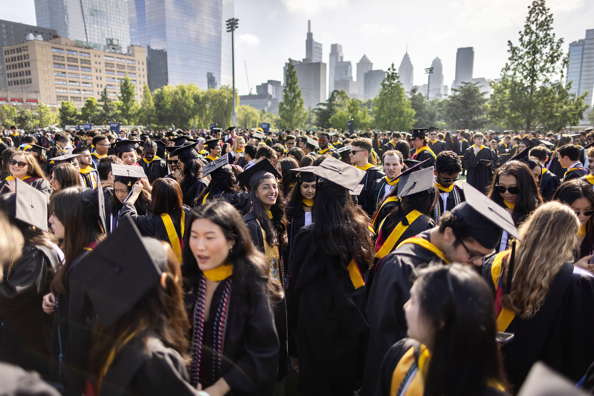 graduates gathering at penn park