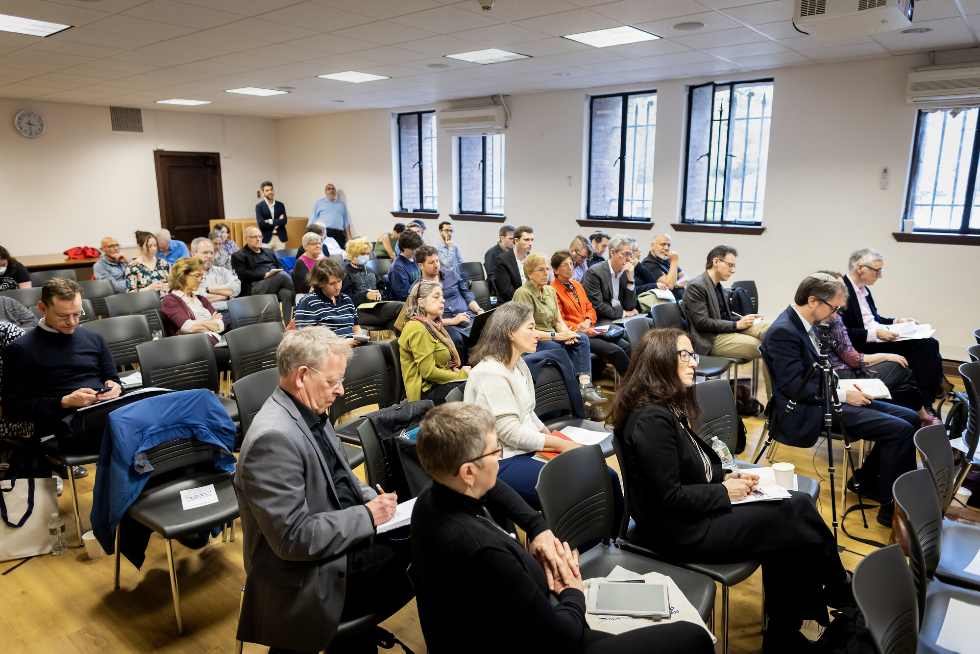 Seated crowd in a seminar room.